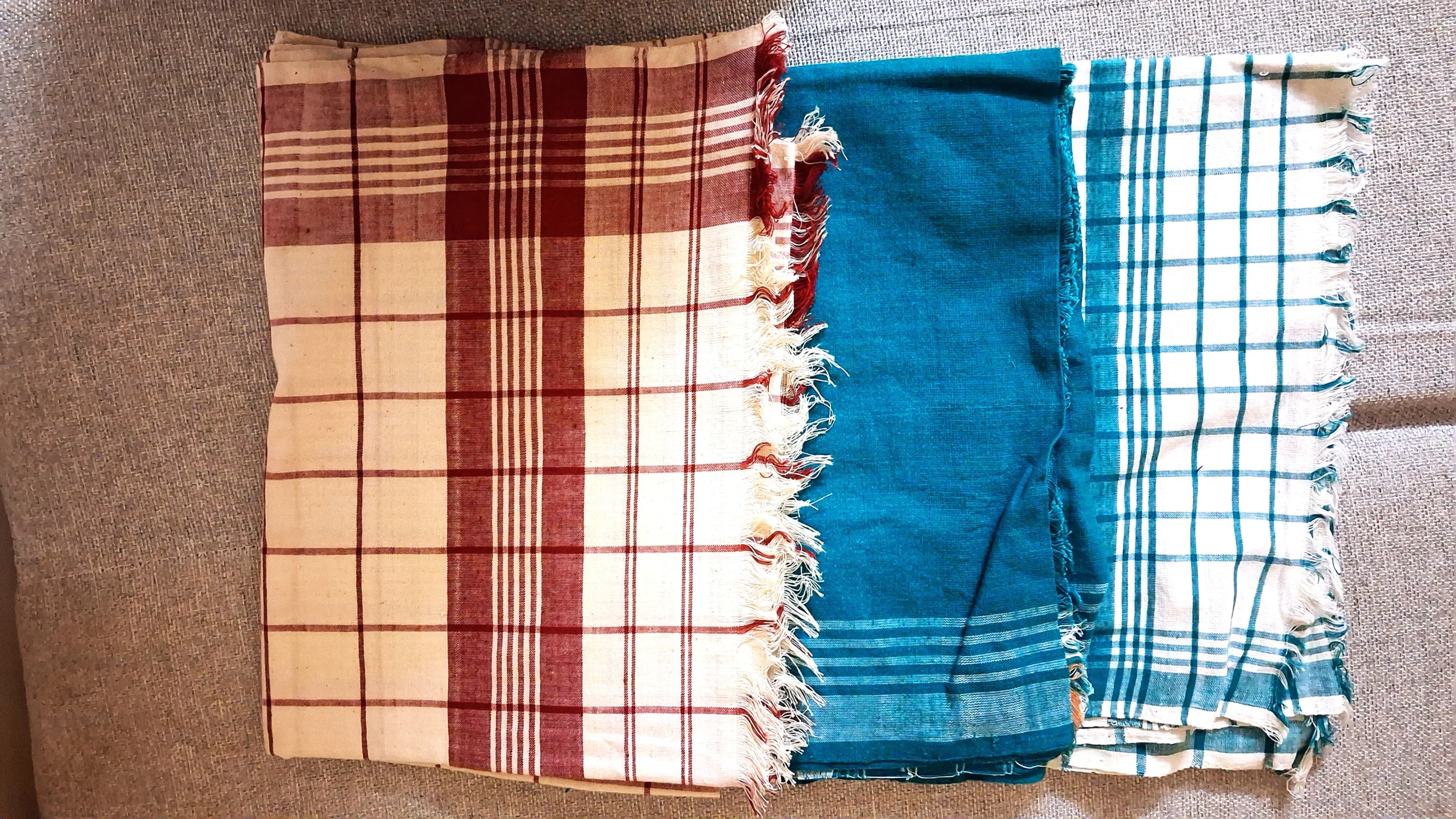 Handwoven Assamese gamocha from Rabha household (Nasiriba) near Guwahati, displayed after purchase