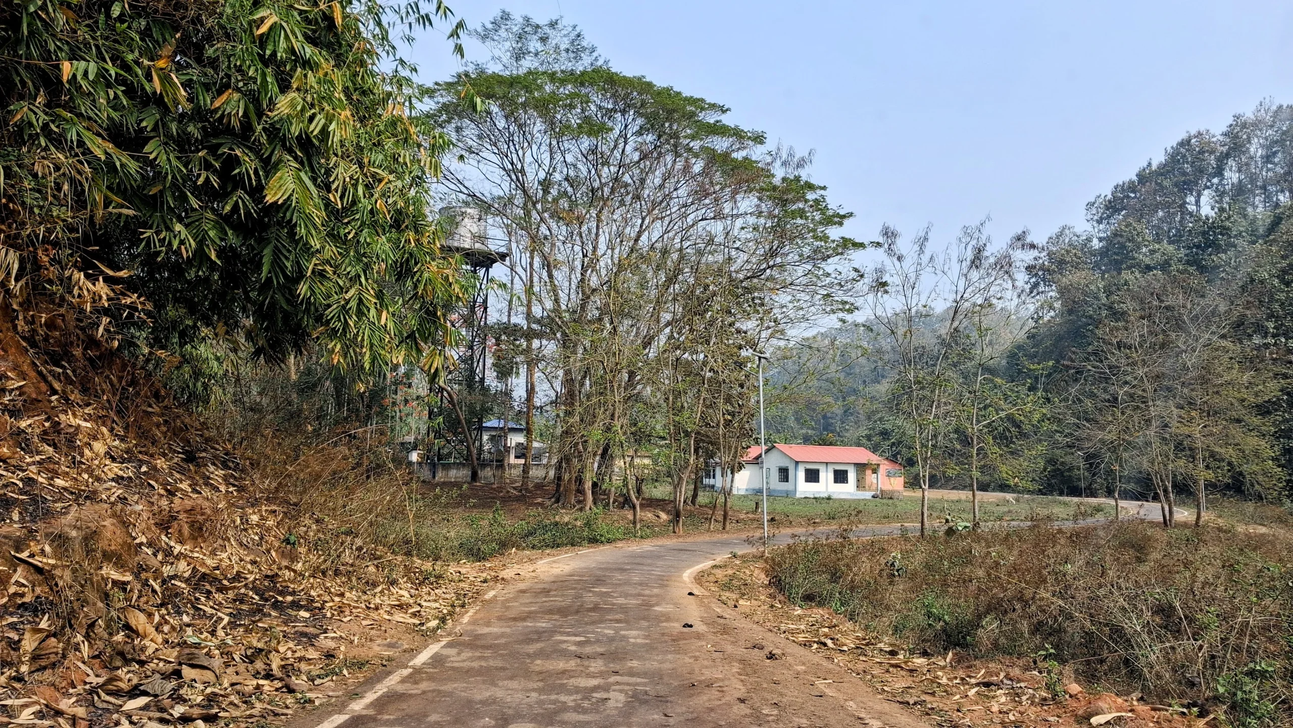 Entering Satargaon village with water tank and primary school landmark