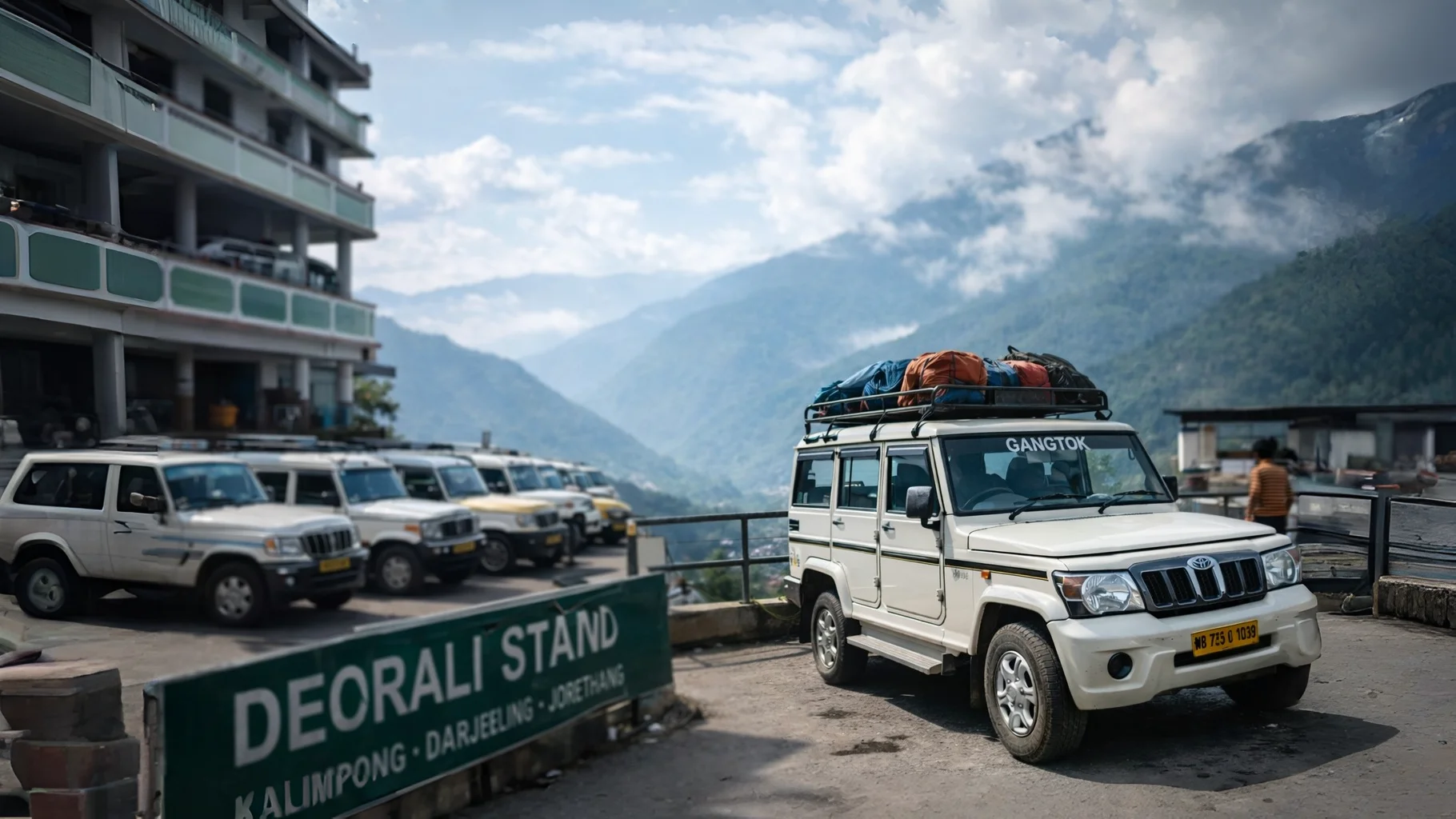 Gangtok Shared Taxi (Sumo/Bolero) at Deorali stand with mountains in background